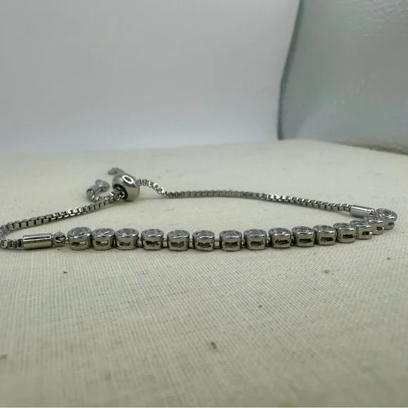Classic Tennis Silver Tone Adjustable Bracelet with Crystals - Picture 2 of 6
